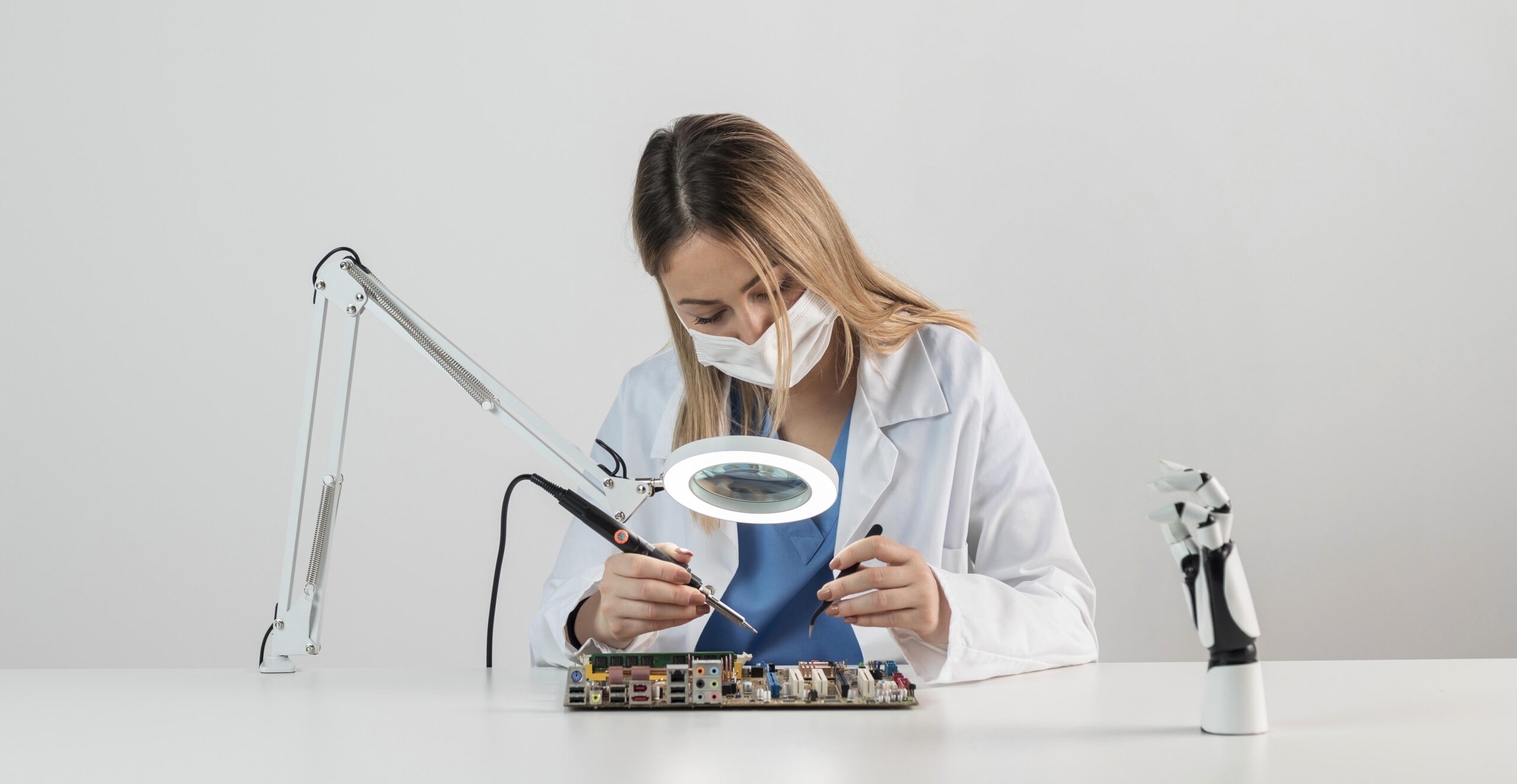 woman with face mask working